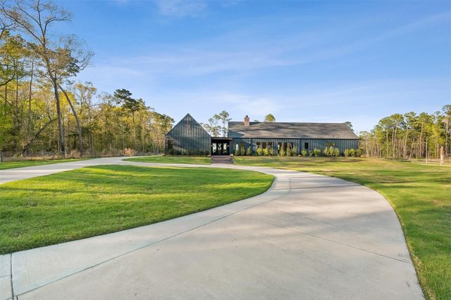 10202 Woodlane Boulevard, Magnolia, TX 77354