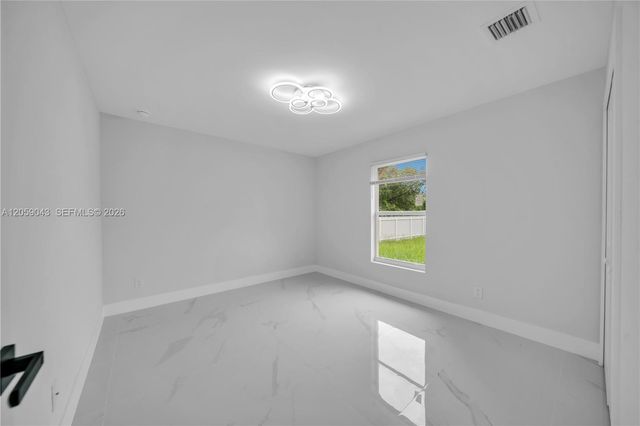 718 Frontenac, Lehigh Acres, FL 33974
