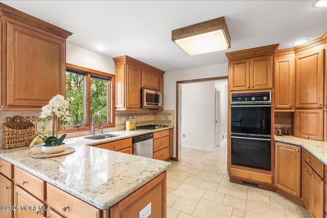 6 Rimwood Drive, Lincroft, NJ 07738