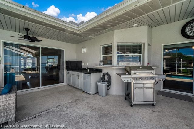 104 Lakefront Court NE, Lake Placid, FL 33852