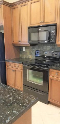 6033 NW 118th Drive 6033, Coral Springs, FL 33076