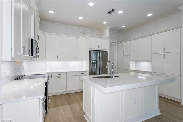 9004 Calypso CT, Naples, FL 34112