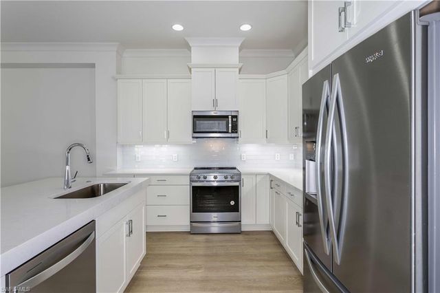 9004 Calypso CT, Naples, FL 34112