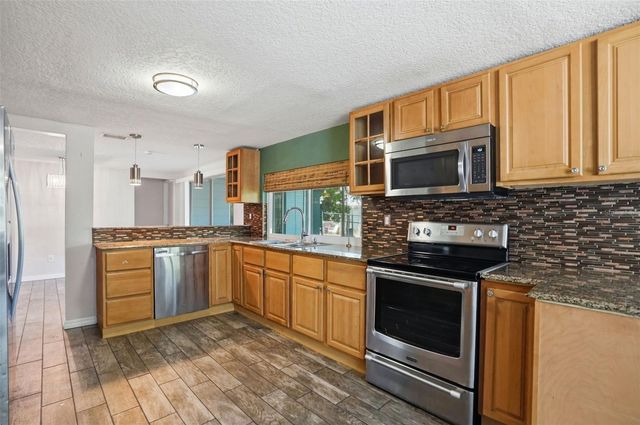 12607 BLACKBERRY ROW, Hudson, FL 34667