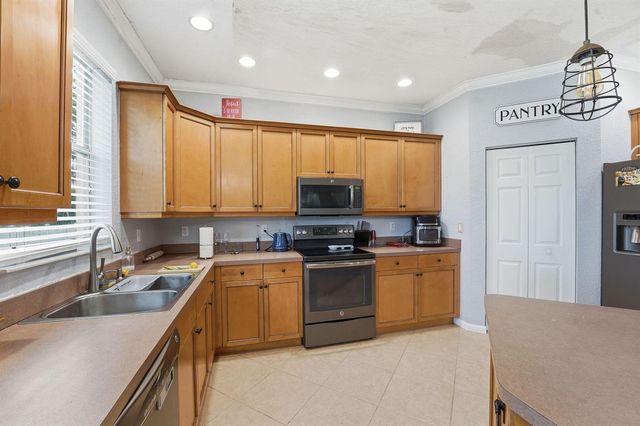 2753 Misty Oaks Circle, Royal Palm Beach, FL 33411