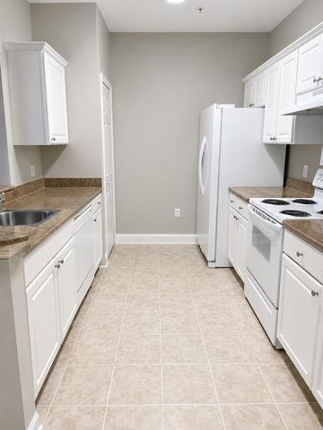 303 SOUTHERN PECAN CIRCLE 107, Winter Garden, FL 34787