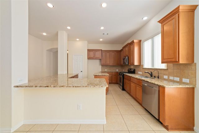 16726 Aliana Lakes Court, Richmond, TX 77407