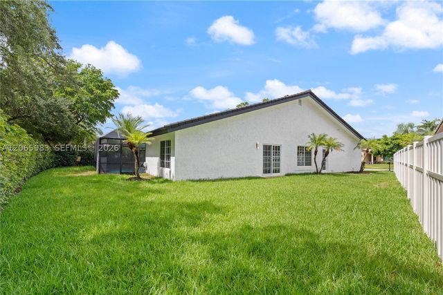 695 NW 107th Ln, Coral Springs, FL 33071
