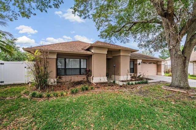 9407 PEBBLE GLEN AVENUE, Tampa, FL 33647