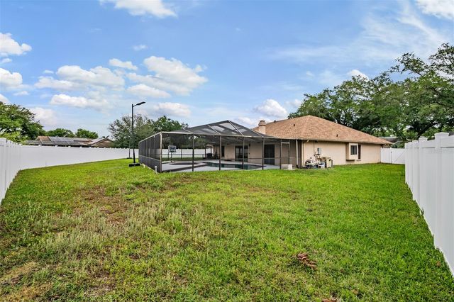 9407 PEBBLE GLEN AVENUE, Tampa, FL 33647