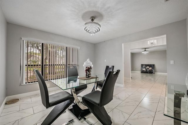 9407 PEBBLE GLEN AVENUE, Tampa, FL 33647