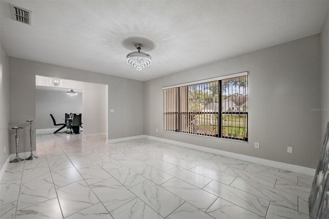 9407 PEBBLE GLEN AVENUE, Tampa, FL 33647