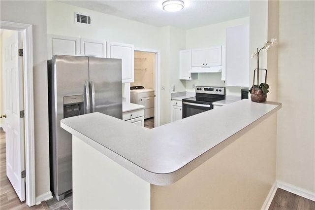 8102 WOODLAND Lane 8102, Alpharetta, GA 30009