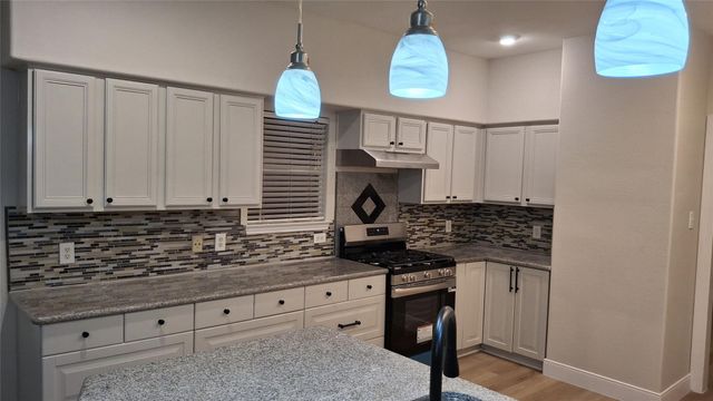 6887 Turtlewood Drive, Houston, TX 77072