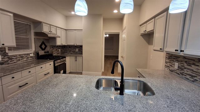 6887 Turtlewood Drive, Houston, TX 77072