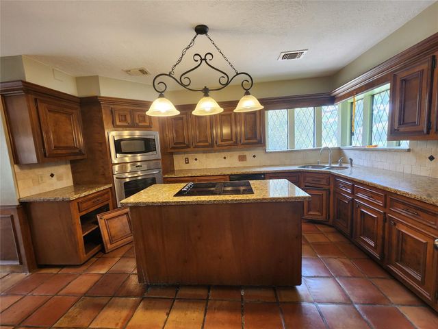 15714 Woodcroft Drive, Houston, TX 77095