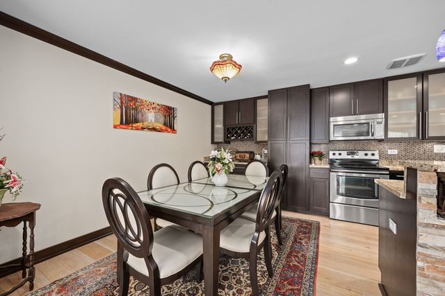 140 Carriage Way Drive C218, Burr Ridge, IL 60527