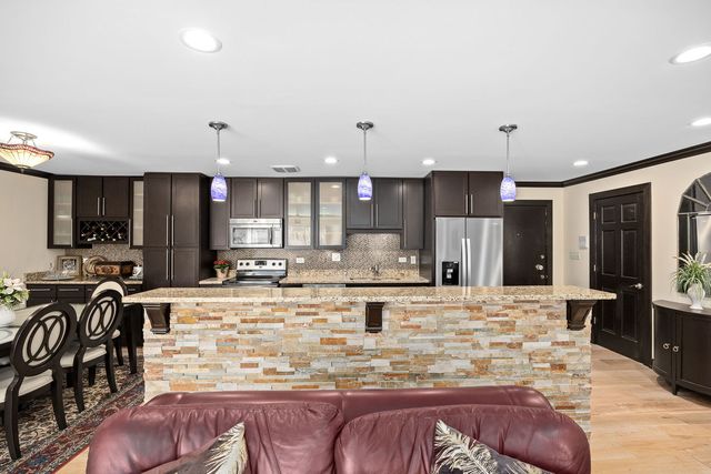 140 Carriage Way Drive C218, Burr Ridge, IL 60527