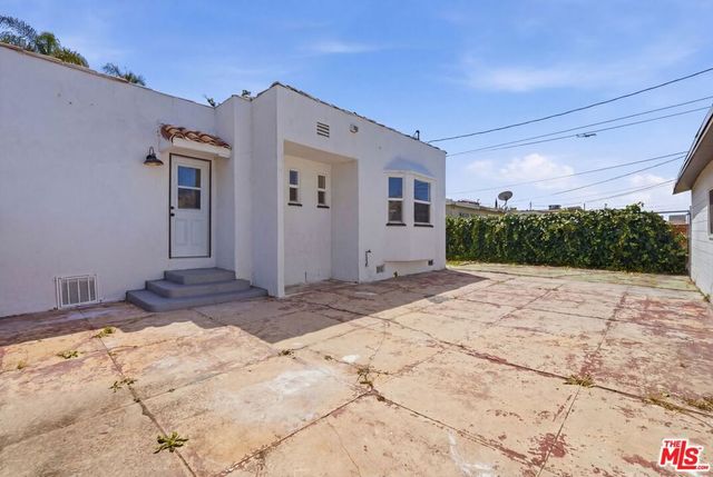 8701 S Denker Avenue, Los Angeles, CA 90047