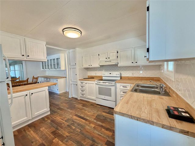 103 TAMARISK WAY, Leesburg, FL 34748