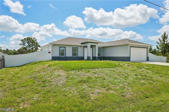 910 Richmond AVE N, Lehigh Acres, FL 33972