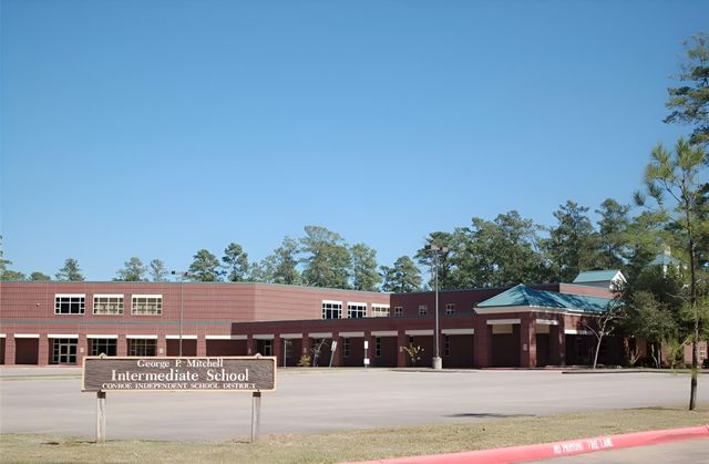 102 N Hollylaurel Circle, The Woodlands, TX 77382