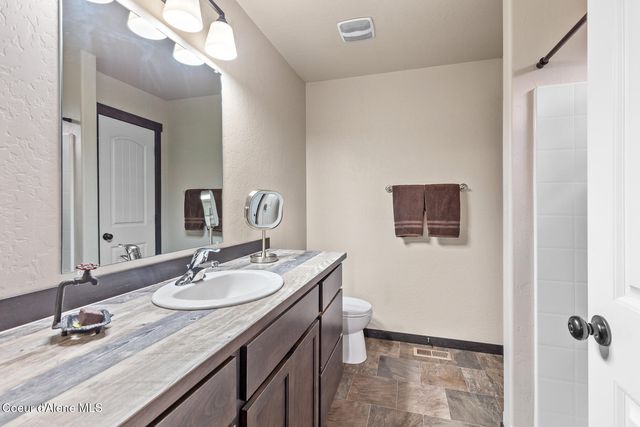 299 Cardinal LN, Spirit Lake, ID 83869