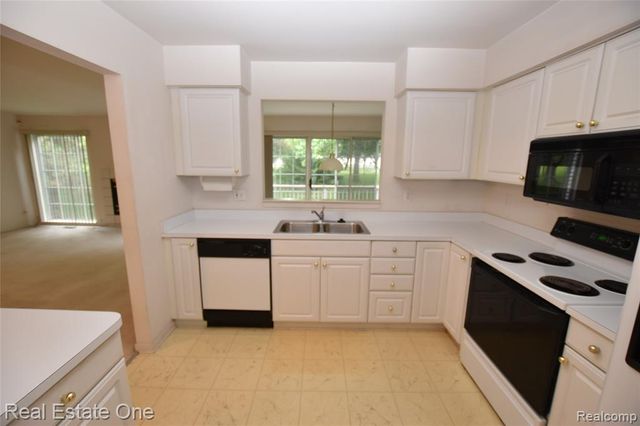 555 Winwood Court, Walled Lake, MI 48390