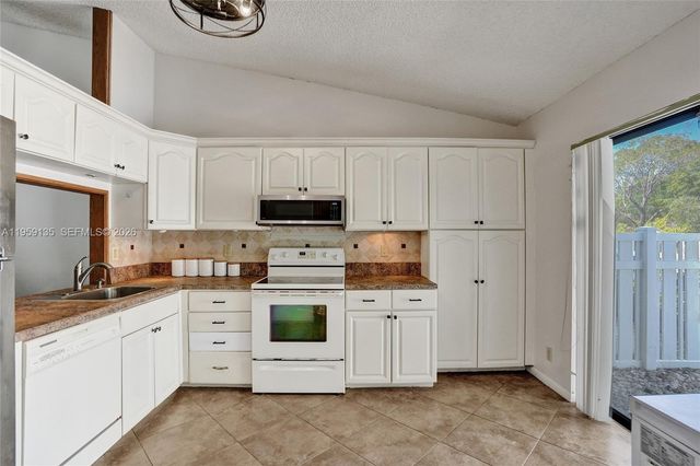 3897 N Carambola Cir N 29127, Coconut Creek, FL 33066