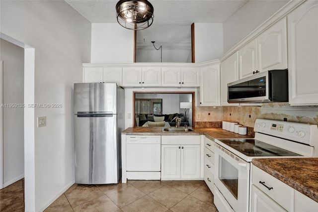 3897 N Carambola Cir N 29127, Coconut Creek, FL 33066