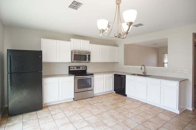 13408 Coomes DR, Del Valle, TX 78617