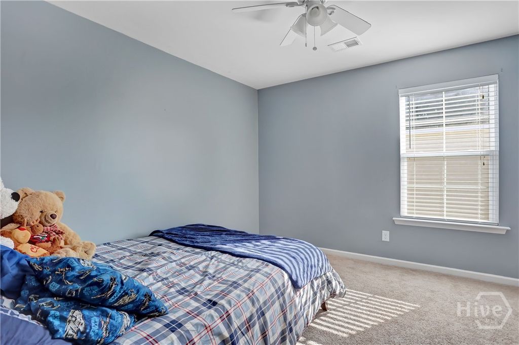 Image 38 of property listing at 821 Garden Hills Loop, Richmond Hill, GA 31324