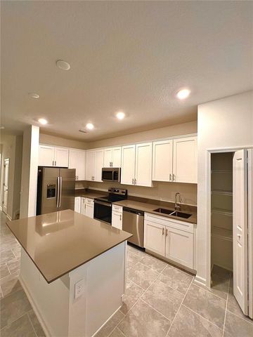 7520 STONE CREEK TRAIL, Kissimmee, FL 34747