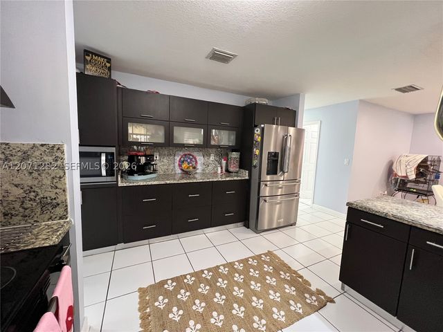 13249 NW 9 LN, Miami, FL 33182