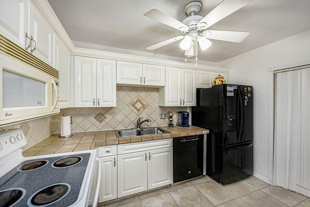 4740 Suburban Pines Drive, Greenacres, FL 33463
