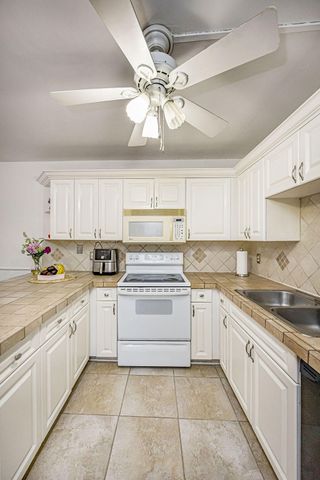 4740 Suburban Pines Drive, Greenacres, FL 33463