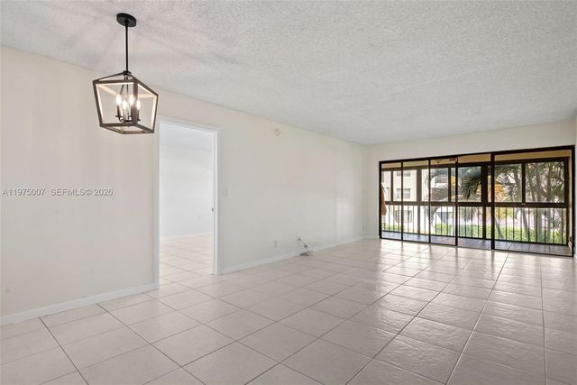 303 Racquet Club Rd 204, Weston, FL 33326