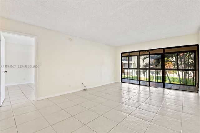 303 Racquet Club Rd 204, Weston, FL 33326