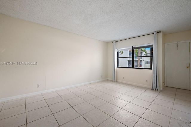 303 Racquet Club Rd 204, Weston, FL 33326