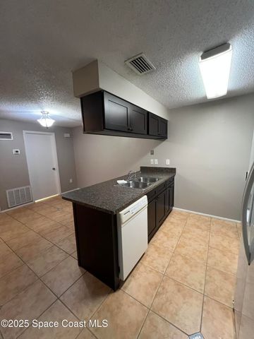 8716 Hibiscus Court, Cape Canaveral, FL 32920