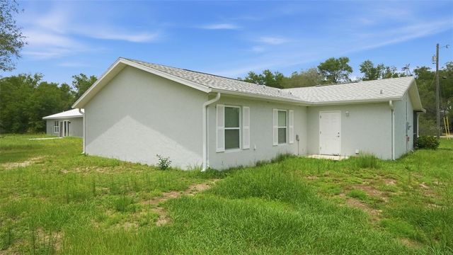 30 MAPLE COURSE, Ocklawaha, FL 32179