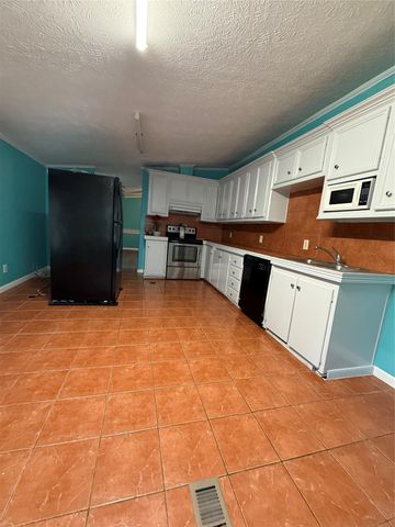 4440 Grand Oaks Drive, Willis, TX 77378