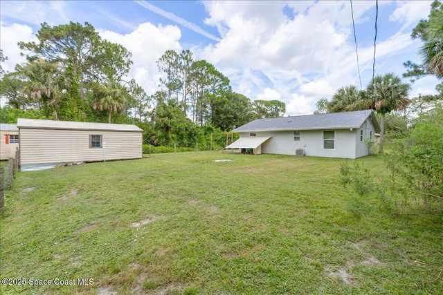 1076 Ivanhoe Street NW, Palm Bay, FL 32907