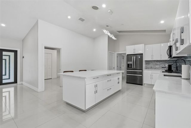 12726 BARRETT DRIVE, Tampa, FL 33624