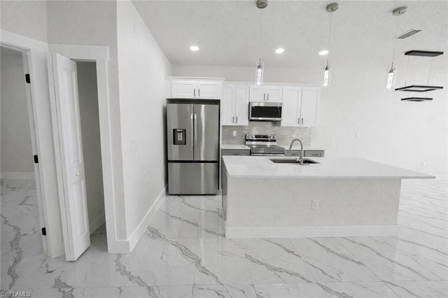 2421 Milton AVE S, Lehigh Acres, FL 33973