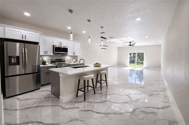 2421 Milton AVE S, Lehigh Acres, FL 33973