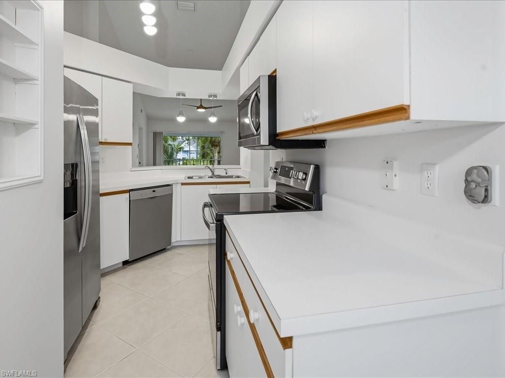 105 Wading Bird CIR U201, NAPLES, FL 34110 — photo 4