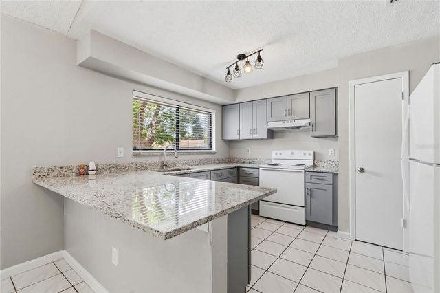 5113 NASHVILLE DRIVE, Tampa, FL 33624