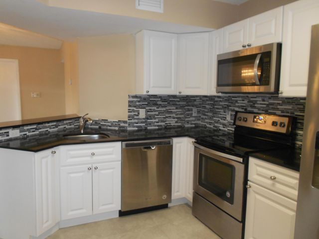 8977 Wiles Road 203, Coral Springs, FL 33067