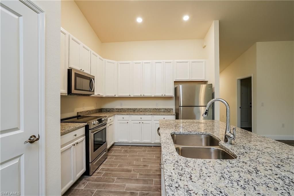 2704 23rd ST W, LEHIGH ACRES, FL 33971 — photo 4
